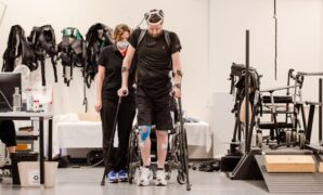 Digital bridge between brain and spine enables paralysed man walk again